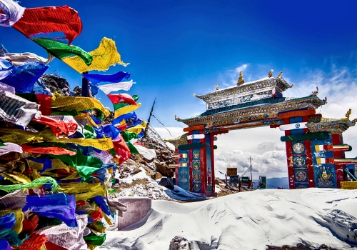 Prayer flags and the Tawang gate in Arunachal Pradesh